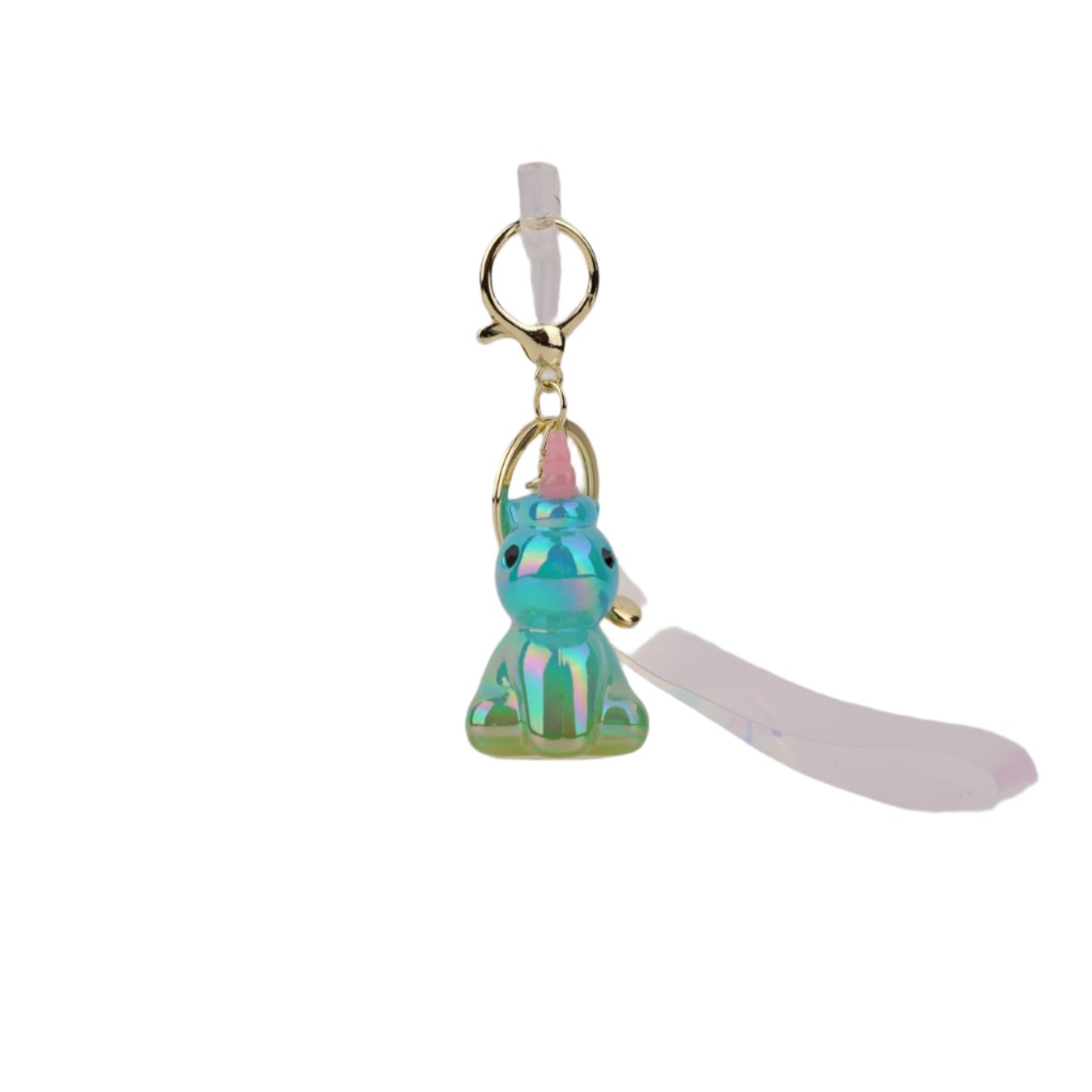 Glossy blue narwhal keyring with a pink horn and playful design, ideal for accessorizing keys, bags, or gifting.