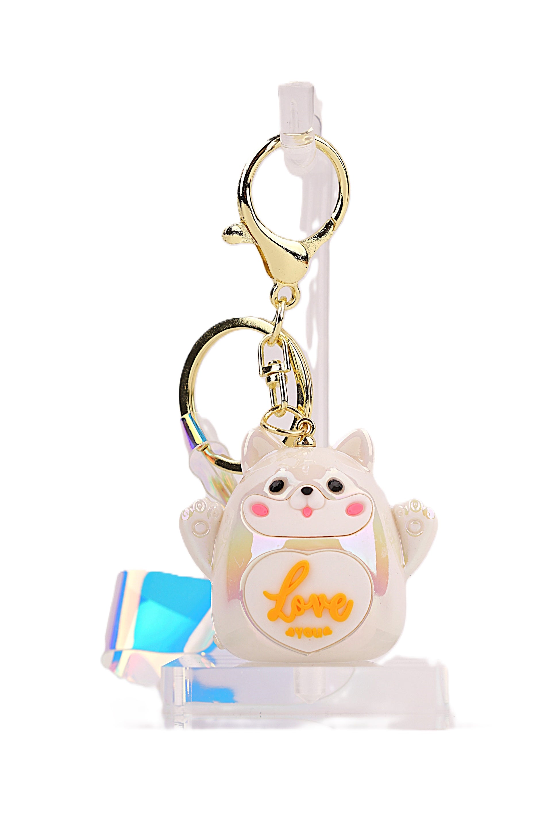 White Shiba Inu keyring with a glossy finish and 'Love' design, featuring a gold clasp, perfect for accessorizing keys, bags, or gifting.